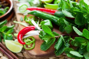 Ginzeng-Our-Philosopy-Fresh-Ingredients-on-a-chopping-Board